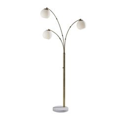 three light floor lamp with marble base and white glass balls on the lampshade