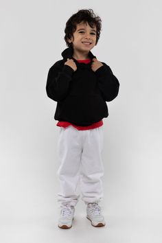 A 14 oz. Heavy Fleece hooded sweatshirt made for kids. Features drop shoulders, long sleeves and a hood. This fleece is very heavy and will provide you with warmth in temperatures as low as 50°F (10°C). These hoodies are made in South Central, Los Angeles by expert sewers using premium construction materials and techniques. Made in Los Angeles, Calif. Our experienced sewers earn up to $25 an hour and no less than $16; additionally workers have healthcare benefits for less than $15 per week, a 40 Made For Kids, Bus Pass, South Central, Construction Materials, Hooded Pullover, Pullover Sweatshirt, Sweatshirt Fashion, Hooded Sweatshirt, Drop Shoulder