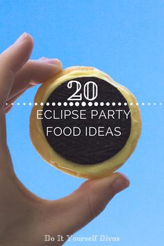 a person holding up a cookie with the words eclipse party food ideas