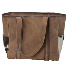 The STS Ranchwear Cowhide Trinity Tote is crafted from the finest cowhide leather and designed to hold everyday essentials. It features a convenient top-handle for easily on-the-go use. Perfect for adding a stylish western touch to your look. GENUINE FULL GRAIN LEATHER; GENUINE COWHIDE LOBSTER CLAW TOP CLOSURE DUAL SHOULDER STRAPS 2 INTERIOR SCRUNCH POCKETS; 1 INTERIOR ZIP POCKET CONCEAL CARRY HOLDER 14"W X 11.5"H X 6.5"D Everyday Leather Shoulder Bag With Patch, Leather Tote Shoulder Bag With Leather Patch, Farm And Ranch, Ranch Wear, Cow Hide, Western Wear, Full Grain Leather, Lobster Claw, Cowhide Leather