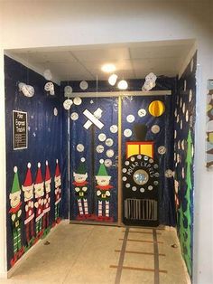 an open door decorated with christmas decorations