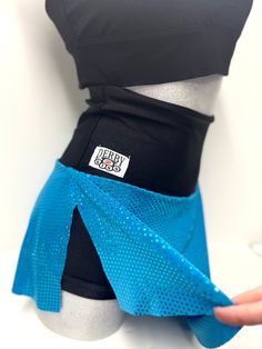 This skort is perfect for roller derby, pole fitness, running or CrossFit!! These are available in sizes s/m-2XL. You can choose between a regular or high waist! They are comfortable and flattering. The shorts have a leg band that help prevent the from riding up. Want a custom or different fabric? Message me Sporty Blue Skort With Built-in Shorts, Blue Stretch Rave Bottoms, Fitted Blue Rave Bottoms, Fitted Blue Bottoms For Rave, Blue Sports Skort Short Length, Blue Sports Skort, Blue Cheerleading Shorts, Blue Shorts For Cheerleading, Blue Sport Skort Short Length