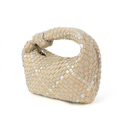 Our handwoven Knot bags are perfect for any occasion! Whether you're headed to a casual brunch, fancy event or a night on the town, this unique bag will make just the right statement. * Woven neoprene & Lycra blend * Zipper enclosure * Shiny gunmetal tone hardware Dimensions: 11" L x 7" H x 2” D, Handle Drop: 3” Beige Woven Party Bag, Trendy Beige Intrecciato Weave Bag, Handheld Woven Shoulder Bag For Party, Evening Bag With Intrecciato Weave In Beige, Party Tote Shoulder Bag With Braided Handles, Beige Evening Bags With Intrecciato Weave, Beige Intrecciato Weave Evening Bag, Beige Woven Leather Clutch Bag, Party Tote Bag With Braided Handles