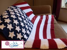 an american flag crocheted afghan sits on a couch