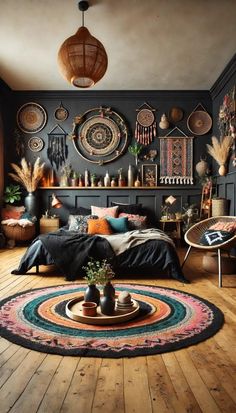 a bedroom with black walls, wooden floors and lots of decorations on the wall above the bed