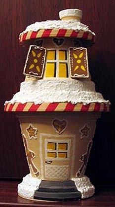 a gingerbread house shaped like a candy shop