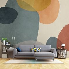 a modern living room with an abstract wallpaper