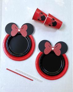 mickey and minnie mouse party supplies on a table