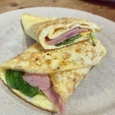 two ham and cheese quesadillas on a plate