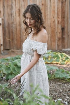 Style // A timeless oatmeal linen dress, our Moon shade is the perfect mix of sand and cream color Effortlessly romantic and oh so pretty, our Menorca Dress is a mid length linen dress designed to transition throughout the year. Pair with sandals for summer or boots for fall and winter. Made from super-soft linen, with puffed sleeves that can be worn the way you love best! Over the shoulder for an elegant square neck line or off-the-shoulder for a feminine touch Fabric Note // Made in Italy from Feminine Linen Dress For Beach, Feminine Linen Dress For The Beach, Spring Linen Dress In Neutral Color, Bohemian Linen Dress For Garden Party, Beige Linen Dress For Summer Brunch, Beige Linen Summer Dress For Brunch, Cottagecore Fitted Linen Dress For Summer, Feminine Linen Dress For Vacation, Cottagecore Linen Dress For Garden Party