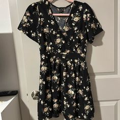 Black Floral Dress. Shein Brand. Zips On The Side. Size Xs. Too Big On Me And Never Worn. Casual Black A-line Floral Dress, Fitted Black Floral Midi Dress, Fitted Black Floral Dress With Short Sleeves, Floral Dress Shein, Black Floral Dress, Shein Dress, Shein Dresses, Dresses Black, Floral Dress Black