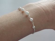 Rosary style pearl bracelet ALL PARTS ARE SOLID STERLING SILVER *White swarovski pearls are 6mm, 5mm, and 4mm *Sturdy chain clasps closed with a larger and thicker spring style clasp *Boxed individually & ready to give Notes: This bracelet is very sturdy without being big or bulky. All components are high quality and solid sterling. Makes a great gift for bridesmaids as it will last a lifetime. Pearl Ideas, Bridesmaid Pearls, Etsy Bridesmaid Gifts, Small Jewelry Box, Jewelry Bridal, Pretty Bracelets, Swarovski Pearls, Small Jewelry, Spring Style