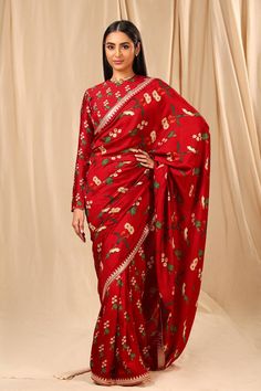 Editor's Note This Red Spring Blossom Raw Silk Sari Is Embellished With Embroidered Border And Tassel Detail To Give You A Desi Vibe! It Comes With Red Cotton Candy Blouse Peice. Note: This Sari Is Free Size And Comes With Unstitched Piece Blouse (1.5 metre Raw Silk) Fabric: Raw Silk Color: Red Fit: Flowy Care: Strictly Dry Clean Only For Digitally Printed Garments & Non-petroleum Dry Clean For Hand-printed Garments. Disclaimer: The Actual Print-placement Of The Product May Vary Slightly From Th Masaba Saree, House Of Masaba, Gota Patti Saree, Caribbean Fashion, Cotton Candy Colors, Raw Silk Saree, Raw Silk Fabric, Embroidered Border, Blossom Print