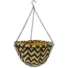 a black and white basket hanging from a chain