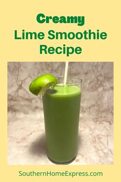 a green smoothie in a tall glass with a lime slice on the rim and text overlay reads creamy lime smoothie recipe