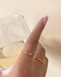 Product Description Featuring a dainty stacking ring with a twisted rope design. Made in 14k gold-fill, she's tarnish-resistant, showerproof, and safe for sensitive skin. Just keep her away from chemicals such as hand sanitizer, soap, and lotion. She looks beautiful stacked or as a solo ring. …………………………………. D E T A I L S • Available from US 5 to 9• Width measures 1mm• Keep away from chemicals such as lotion, soap, and hand sanitizer• Tarnish-resistant, waterproof, and safe for sensitive skin • 1 Teen Ring, Multiple Rings, Soft Toothbrush, Gold Ring Stack, Snake Ring, Rope Design, Jewelry Lookbook, Tiny Heart, Dream Jewelry