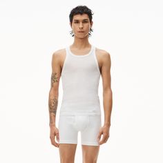 Semi-sheer Classic Tank With Logo Patch At Left Hip In White Ribbed Cotton                                                                    Form-fitting Bottom Hem Hits At Hips                                                      Composition: 100% Cotton Made In China Model Is 6'0 And Wears Size M Ml001100 - Color: White. Gender: Male Tank Top White, White Tank Top, Racerback Tank Top, Alexander Wang, Racerback Tank, Basic Tank Top, Patch Logo, Made In China, Alexander