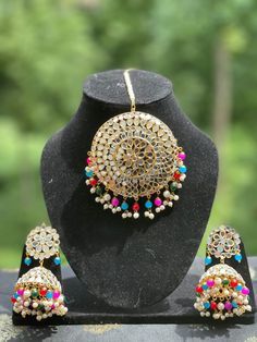 New product description: Glam up your Indian look with this gorgeous, lightweight Maang Tikka and Jhumka set. Perfect for weddings, this Maang Tikka and Jhumka set is the perfect addition to your wardrobe. Features: -Gorgeous and lightweight -Oversized Maang Tikka and Jhumka set -Ideal for Indian weddings -The perfect addition to your wardrobe Jhumka Set, Jaipur Jewelry, Heavy Earrings, Indian Look, Maang Tikka, Deodorant Spray, Indian Weddings, Earrings Set, Indian Wedding