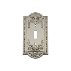 an ornate light switch plate cover