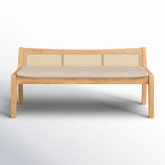 a wooden bench sitting on top of a white floor