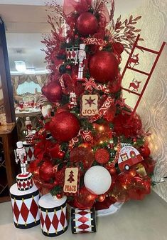 a christmas tree decorated with red and white ornaments