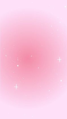 a pink background with white stars in the middle