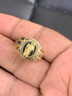 ● Mens Real Gold 10K Solid Yellow Gold Black Onyx 10 Karat Ring St Jude Saint Jude Ring Judas Catholic Religious Anillo  Mens Jewelry ●Metal : 10K Solid Yellow Gold ●Purity : 10k with authenticity stamp ●Made in : United States ● Stone: Black Onyx ●Shape : Saint Jude St Jude St Judas ● Size: 9.5 ● Weight: Approx 6.6 Grams ● Size: (Message us for custom size) If sizing is needed then message before placing your order for the price. The item will not be eligible for return if the sizing is done also the price will change if sizing is needed. ●Condition : Brand New ●Complimentary Premium Jewelry box included ●Free Shipping within U.S.A Be sure to hit "favorite" on the right so it remains on your favorites list and/ or add to your wishlist(s). BUY GENUINE GOLD JEWELRY WITH 100% CONFIDENCE Black 14k Gold Hallmarked Engraved Ring, Quinceañera Jewelry, St Judas, Quinceanera Jewelry, Billing Format, Saint Jude, St Jude, Jewelry Metal, Stamp Making