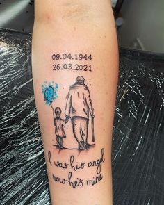 a person with a tattoo on their leg has a blue balloon in the shape of a man's hand