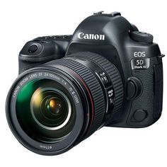 the canon eos 5d mark ii is shown with its lens attached to it