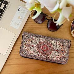 This Boho wallet is made of Turkish carpet patterned brocade fabric. This womens wallet has a soft feel and enough space with 12 card slots and also space for a cell phone. Its ethnicity and elegance comes from the traditional Turkish carpet motives used on the front and the back. These kilim wallets are designed and handmade in Cappadocia,Turkey. The designs of our carpet wallets are inspired by bohemian and vintage. If you would like a distinctive, unique and elegant wallet/purse, you are at t Traditional Brown Wallet For Gift, Traditional Brown Wallets For Gifts, Traditional Brown Wallets As Gifts, Bohemian Brown Rectangular Wallet, Artisan Rectangular Wallets For Daily Use, Multicolor Wallets With Card Slots As Gift, Artisan Bifold Wallets As Gifts, Artisan Wallet With Interior Card Slots As Gift, Multicolor Wallets With Card Slots For Gift