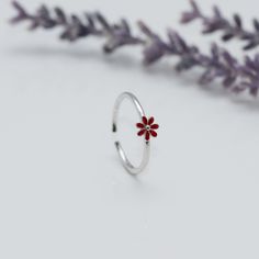 Adjustable ring with delicate red flower design, made of 925 Sterling silver in a minimalist style, ideal gift for girl, teenager or woman. Material: 100% 925 Sterling Silver. Weight: 1.00 grams. Measure:  Adjustable US 6-7 Band width: 1mm.  All orders will be shipped out within 1 business days after the order has been received. UNITED STATES - USPS First Class Mail or Priority mail. * 2 - 4 Business Days * Includes Tracking. International orders, USPS International First Class * 14 days * Inclu Red Flower Jewelry For Spring, Red Flower-shaped Jewelry For Spring, Red Flower-shaped Spring Jewelry, Minimalist Rings For Spring Gift, Minimalist Ring As Spring Gift, Minimalist Rings As Spring Season Gifts, Minimalist Ring As Spring Season Gift, Minimalist Spring Rings For Gift, Red Sterling Silver Flower Ring As Gift