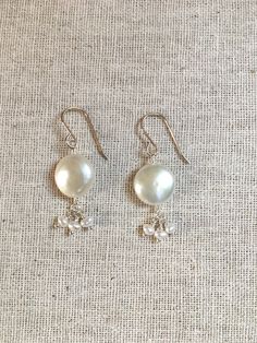 A personal favorite from my Etsy shop https://www.etsy.com/listing/596066086/freshwater-pearl-silver-dangle-earrings Coin Pearls, Silver Dangle Earrings, Handmade Gold, Silver Earrings Dangle, Silver Pearls, Jewelry Designs, Fresh Water, Sterling Silver Earrings, Freshwater Pearls