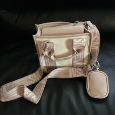 Brand New Never Used Has Tag Still On Steve Madden Bwebber Canvas Crossbody Convertible Tote Purse Bottom Width 8 Inches X Height 8 Inches Depth 4.5 Inches Faux Leather Trim And Silver Tone Hardware Accents Zipper Pocket Inside And 2 Open Pockets Magnetic Snap Closure Adjustable Removable Guitar Style Crossbody Strap Color Is Ivory With A Muted Blush. Earbuds Case. Cream Crossbody Box Bag With Adjustable Strap, Cream Crossbody Box Bag With Removable Pouch, Beige Crossbody Box Bag With Detachable Strap, Cream Travel Crossbody Box Bag, Cream Crossbody Box Bag For Travel, Travel Cream Crossbody Box Bag, Earbuds Case, Tote Purse, Crossbody Strap