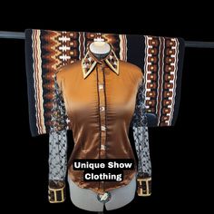 We specialise in Showmanship, Horsemanship, Western Rodeo Queen Jackets, Show shirts, Show Pad and Show vest. Unveiling our Brand New Bronze Showmanship Shirt and Pad set done by UniqueShowClothing❤️ All the designs are made with beautiful pattern and comfortable material to avoid any problems related to design and fitting with a scope of future alterations. We priorities your comfort for your riding, by using high quality strechable cloth,which gives you freedom to move effortlessly being light, cool, comfortable and stylish. In our expressive designs We also offer our customers to use Leather instead of rexin in our Swirls Pattern and in different styles, In terms of crystals and stones we use Imported Material Preciosa like in this jacket. So we offer both exclusive and inexpensive desi Fitted Western Shirt For Western-themed Events, Fitted Long Sleeve Shirt For Western-themed Events, Fitted Brown Shirt For Rodeo, Fitted Western Brown Shirt, Fitted Brown Western Shirt, Brown Fitted Western Shirt, Western Pleasure Outfit, Western Horse Riding, Horse Riding Shirt