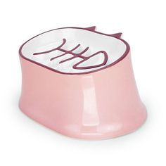 a pink cat bowl with a white and red design