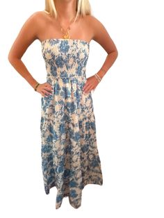 Introducing the Eliza Dress in Blue Embrace elegance and charm with the stunning Eliza Dress. This beautiful strapless maxi dress features a delightful floral smocked design that effortlessly combines comfort with style. Key Features: Floral Smocked Design: The intricate floral pattern adds a touch of femininity, making it perfect for any occasion. Comfortable Strapless Fit: Enjoy the freedom of movement with a secure strapless design that flatters the shoulders. Flowy Maxi Length: The elegant m White Strapless Maxi Dress, Eliza Dress, White Strapless Dress, Preppy Dresses, Bandeau Dress, Strapless Maxi, Strapless Maxi Dress, Christmas List, Formal Event