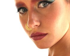 "Unique Large Tribal Nose Ring, 14K Solid Yellow / Rose Gold Piercing Jewelry, fits all Piercing Locations: Nose ring ,Septum, Daith, Rook, Tragus, Helix, Cartilage, 16g-20g Gauge A nose ring can be just the thing to make an ordinary outfit outstanding. This nose ring is made of the finest 14K solid gold. It is lightweight, comfortable and easy to wear. With its tribal style inspired shape, this oriental nose ring will add a perfect authentic touch to your everyday look, or super cool, bold & ro Bohemian Nose Rings For Festivals, Nose Ring Hoop Boho, Bohemian Gold Nose Rings For Festival, Traditional Gold Hoop Nose Rings, Bohemian Gold Nickel-free Nose Ring, Nose Ring Designs, Gold Nose Hoop, Indian Nose Ring, Gold Nose Rings