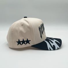 Elevate your look with the Vengeance Snapback from Invincible Exclusives. Style, luxury, and confidence in every thread. Cream canvas, black brim with white detailing, black embroidery Invincible script + signature stars on sides Snapback closure Custom interior lining and tag 100% made from scratch Designed in Detroit White Fitted Snapback Hat With Curved Brim, White Fitted Baseball Cap With Curved Brim, Cream Adjustable Hat For Streetwear, Adjustable Cream Hats For Streetwear, Adjustable Cream Hat For Streetwear, Custom Interior, Black Embroidery, Made From Scratch, Elevate Your Look