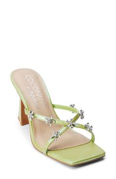 Sparkling crystal flowers dot the slim crisscross straps of a slide sandal balanced by a squared-off toe and an angled block heel. 3 3/4" heel Synthetic upper, lining and sole Imported Levi Dress, Dress Sandals Flat, Vegan Heels, Vegan Sandals, Crystal Flowers, Bridal Wedding Shoes, Green Heels, Crystal Ornament, Block Heel Sandals