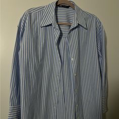 Casual Zara Shirt. For Everyday Wear In Xs. Never Worn. Blue White Straps. Looks Beautiful Under Sweaters/Sweatshirts As Well As Over Tops Or T Shirts. Blue Zara Shirt For Daywear, Zara Blue Shirt For Daywear, Classic Blue Blouse For Day Out, Blue Button-up Zara Tops, Zara Blue Shirt For Day Out, Zara Shirt, Tops Casual, Zara Tops, Casual Tops