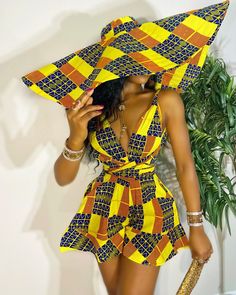 Description: African print infinity Romper/Shorts can be worn in more than 10 different ways 2 side pockets Elastic Back Made with high quality African print wax fabric 100% Cotton Designed and made in the USA NOTE: The hat is sold separately. Care Instruction: HAND WASH IN COLD WATER USE MILD DETERGENT Printed Bridesmaid Dresses, Cabello Afro Natural, African Print Jumpsuit, African Dresses For Kids, African Wedding Dress, Romper Shorts, African Inspired Fashion, African Print Dress, African Print Dresses