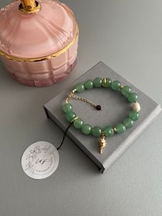 The bracelet is made of green aventurine with the addition of white pearl and gold shell. Also, the chain is also complemented by a garnet bead. This summer bracelet made of natural stones will be a wonderful gift for yourself, a friend or a loved one. The length of the bracelet is 18 cm. The diameter of green aventurine beads is 1 cm. 🫶This bracelet is HANDMADE and not a machine made/manufactured. 🎁 Each bracelet comes with a beautiful gift wrap. NOTE: All natural stones will have slight colo Handmade Elegant Aventurine Bracelets, Aventurine Beaded Bracelet, Green Aventurine Beaded Crystal Bracelet, Hand-strung Aventurine Bracelet, Hand-strung Aventurine Beaded Bracelets, Green Aventurine Bracelet, Aventurine Bracelet, Summer Bracelet, Bracelets Diy