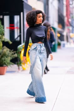 Yara Shahidi’s Outfits of the Week including wide leg jeans, denim on denim, and a great puffer over plaid shorts High Fashion Denim Outfit, Denim Wide Leg Pants Outfit High Waist, Wide Leg Denim Shorts Outfit, Bubble Jeans Outfit, Womens Denim Outfits, Denim Wide Leg Jeans Outfit, Shorts In The Fall Outfits, Wide Leg High Waist Jeans Outfit, All Jean Outfits For Women