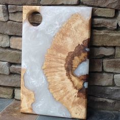 Maple burl with pearl white resin charcuterie board Handcrafted by Michael's Woodcrafts Greenville SC. Woodartist, woodworking and woodcrafts. #woodwork #charcuterieboard #charcuterieboards #servingboard #cuttingboard #fooddies #foodgawker #diywoodwork #charcterie #foodboard #grazingboard Charcuterie Board With Epoxy Inlay, Resin Boards Ideas, Charcuterie Board Woodworking, Charcuterie Design, Epoxy Charcuterie Board, Epoxy Board, Resin Boards, Burled Wood Table, Charcuterie Board Diy