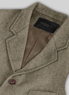 Wrap yourself in the epitome of luxury and timeless design with our Italian Highlander Stone Beige Herringbone Tweed Hunting Vest. Meticulously crafted from pure wool, this exquisite fabric marries unparalleled craftsmanship with the robust essence of the highlands. The subtle stone beige hue, interwoven with the classic herringbone pattern, offers a versatile and sophisticated choice for bespoke tailoring. Perfect for making a refined statement at business meetings, upscale social gatherings, or any event where sophistication is key.   The Hunting Vest was inspired and worn by the British and American in the late 19th century and early 20th century. In order to keep warm when hunting in the cold and humid season, thick and wear-resistant fabrics are used for both the front and back of the Classic Tweed Jacket With Herringbone Pattern, Classic Tailored Tweed Jacket With Herringbone Pattern, Tailored Wool Tweed Jacket, Semi-formal Wool Tweed Jacket With Herringbone Pattern, Luxury Tweed Jacket With Herringbone Pattern For Business, Classic Fitted Wool Tweed Jacket, Luxury Herringbone Tweed Jacket For Tailoring, Luxury Tailored Tweed Jacket With Herringbone Pattern, Classic Wool Tweed Jacket With Herringbone Pattern