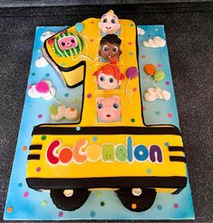 a birthday cake that is shaped like a school bus