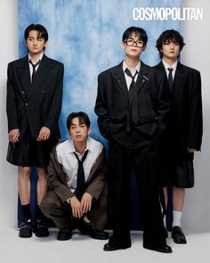 three young men in suits and ties posing for a photo with the caption'cosmopolian '