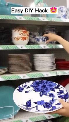 a person holding a plate in front of a shelf full of plates and bowls with the words easy diy hack on it