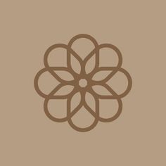 a brown flower on a beige background