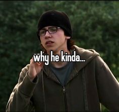 a young man wearing glasses and a beanie is making a funny face with the words why he kinda